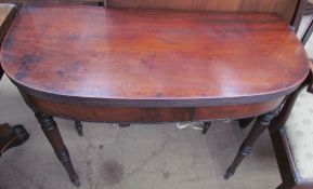 A 19th century mahogany tea table,