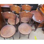 A set of four Fischel bentwood dining chairs with faux crocodile textured seats and back together