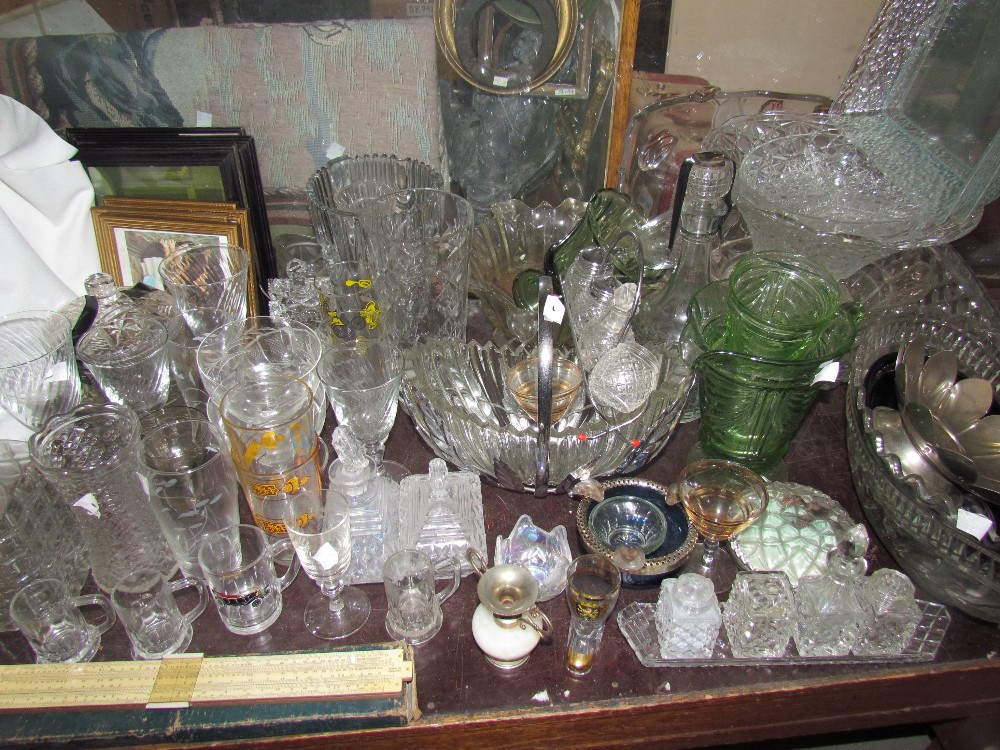 Assorted glass vases, glass bowls, drinking glasses,