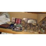 Assorted electroplated wares including cased grape scissors, cased knives and forks,