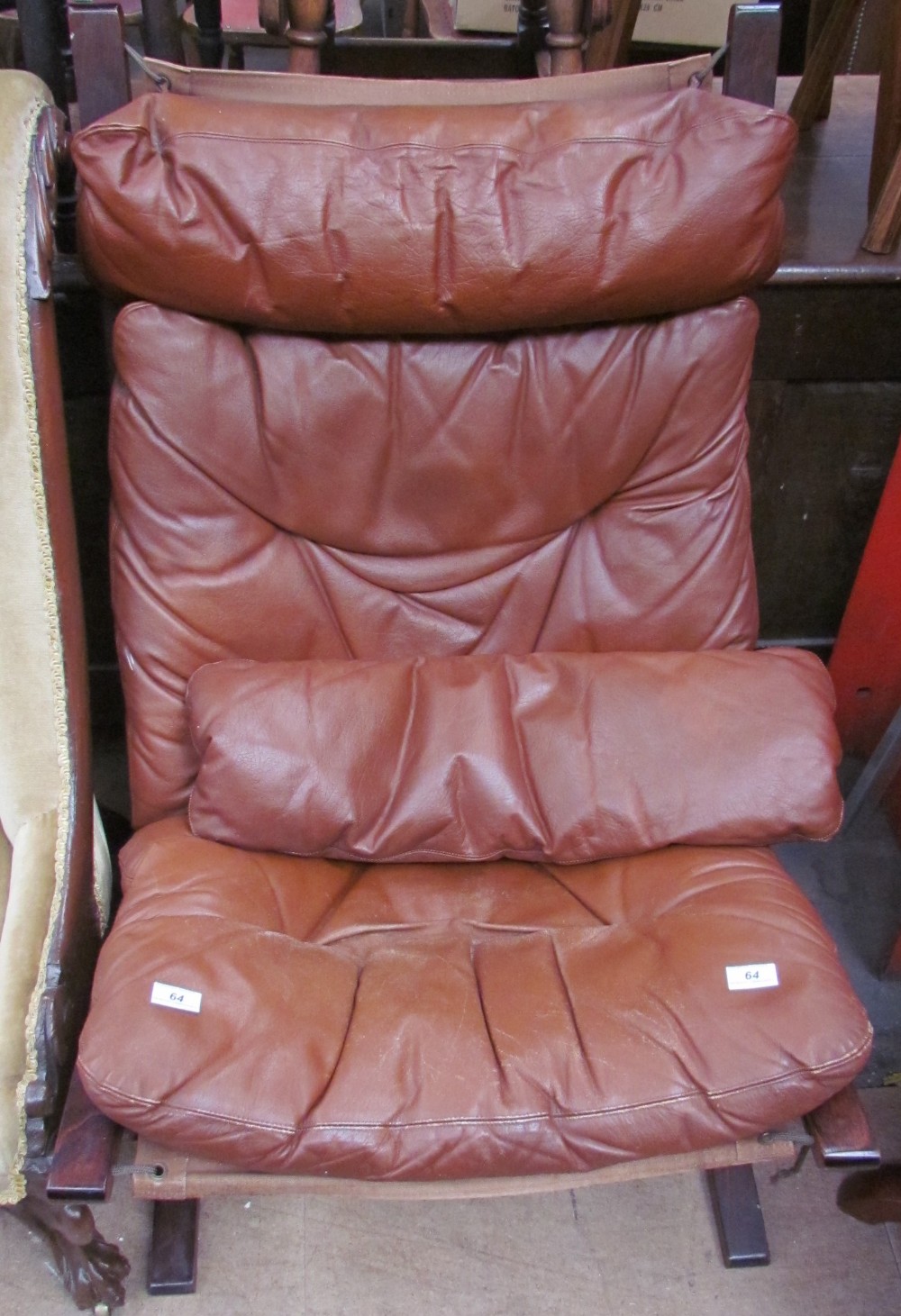 A 20th century leather and canvas upholstered chair