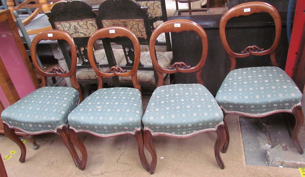 A set of six Victorian mahogany balloon back dining chairs with upholstered seats on shaped legs - Image 2 of 3