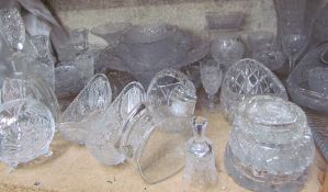 A large collection of Bohemian glass wares including vases, drinking glasses, bowls, dishes,