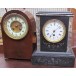 A late Victorian black slate mantle clock,