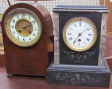 A late Victorian black slate mantle clock,