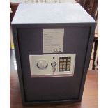 An Argos Home electronic safe with an key pad and override keys