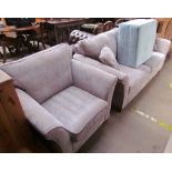 An upholstered two seater settee together with a matching arm chair and a footstool