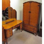 A 20th century burr walnut wardrobe and matching dressing table