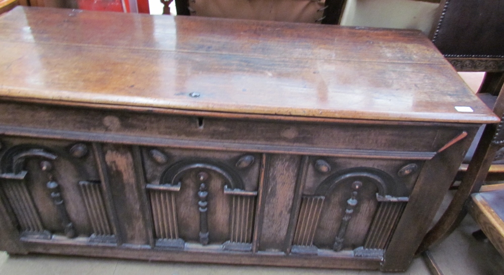 An 18th century oak coffer,