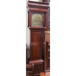 A 19th century mahogany longcase clock, with a stepped hood above a long trunk door,