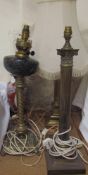 A marbled glass oil lamp on a brass column converted to electricity together with assorted brass