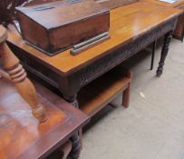 A 20th century oak refectory dining table of rectangular form on turned legs together with a teak