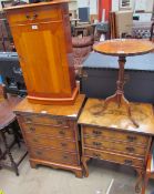 A 20th century walnut chest of drawers with a foldover top,