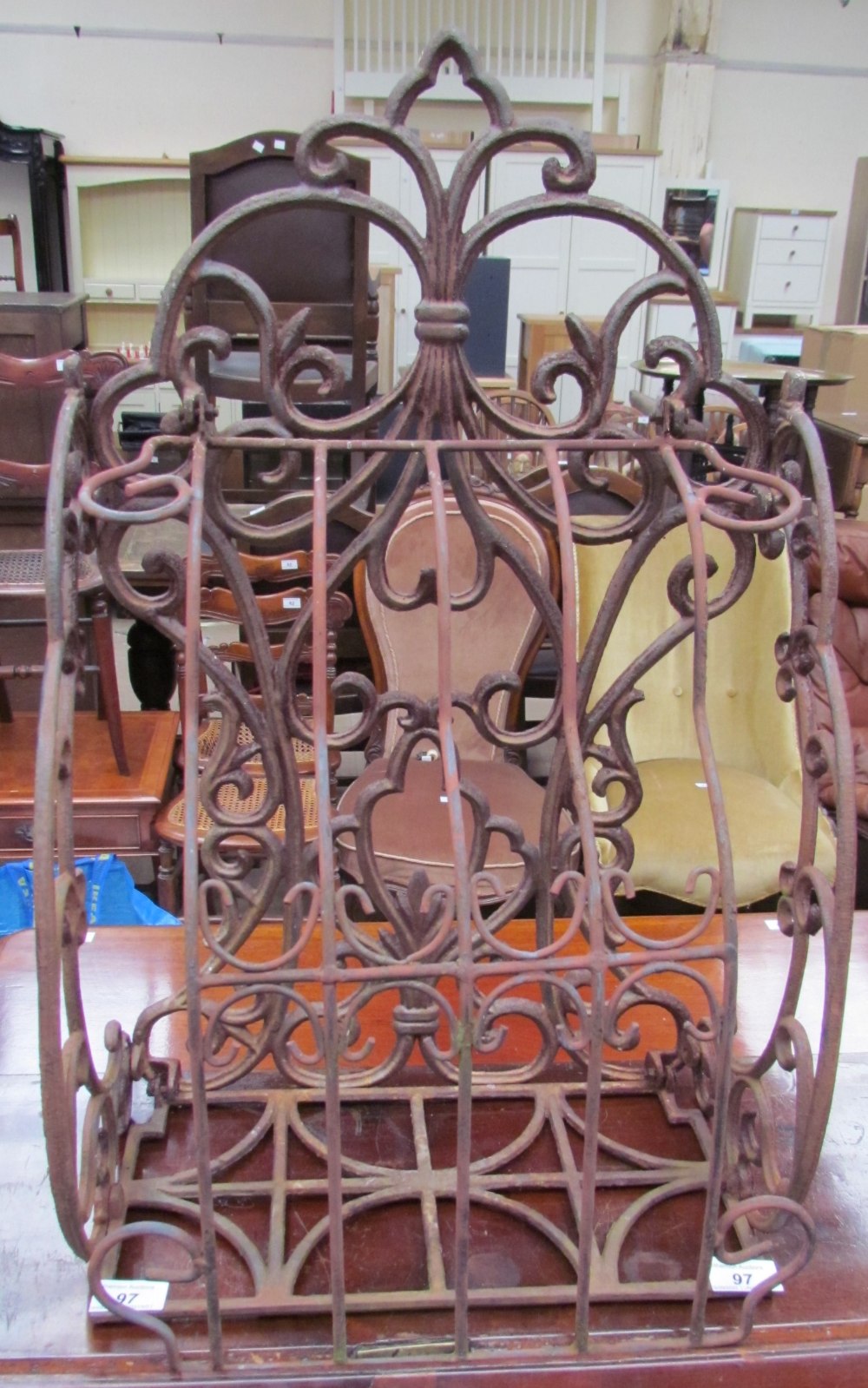 A cast iron wall rack,