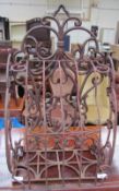 A cast iron wall rack,