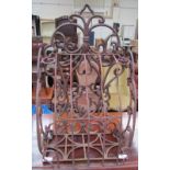 A cast iron wall rack,