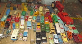 A collection of Dinky and Corgi toys including a luxury coach, Austin A105, Ford Sedan,
