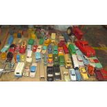 A collection of Dinky and Corgi toys including a luxury coach, Austin A105, Ford Sedan,