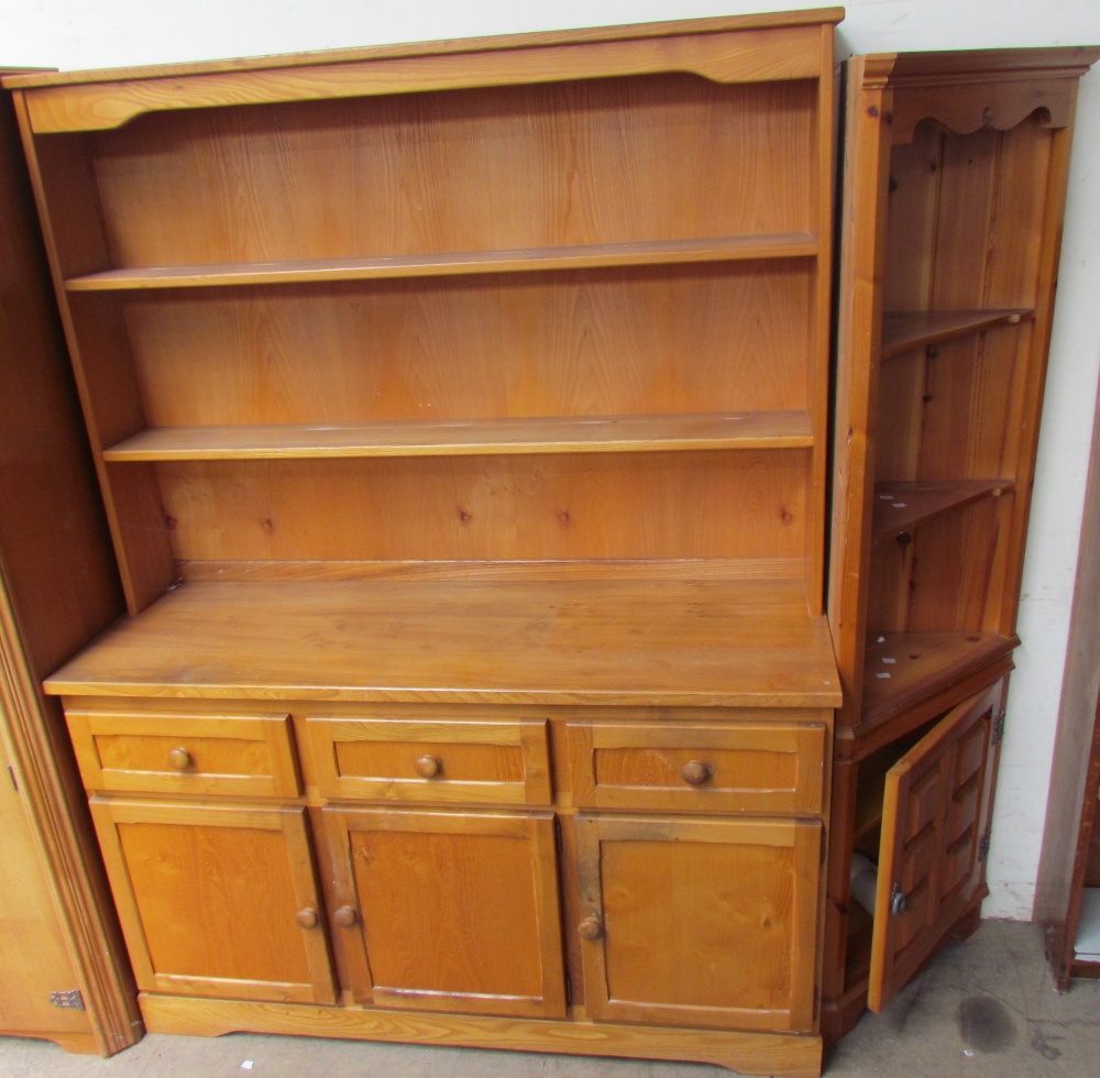 A 20th century ash dresser with a planked back above three short drawers and three cupboards on a