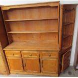A 20th century ash dresser with a planked back above three short drawers and three cupboards on a