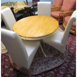 A modern cream painted and natural wood extending dining table together with a set of four cream