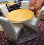 A modern cream painted and natural wood extending dining table together with a set of four cream