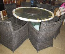 Garden furniture - A Hartman wicker table and six chairs with a lazy Susan to the centre