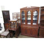 A 20th century oak gateleg dining table together with a set of five oak ladder back dining chairs,