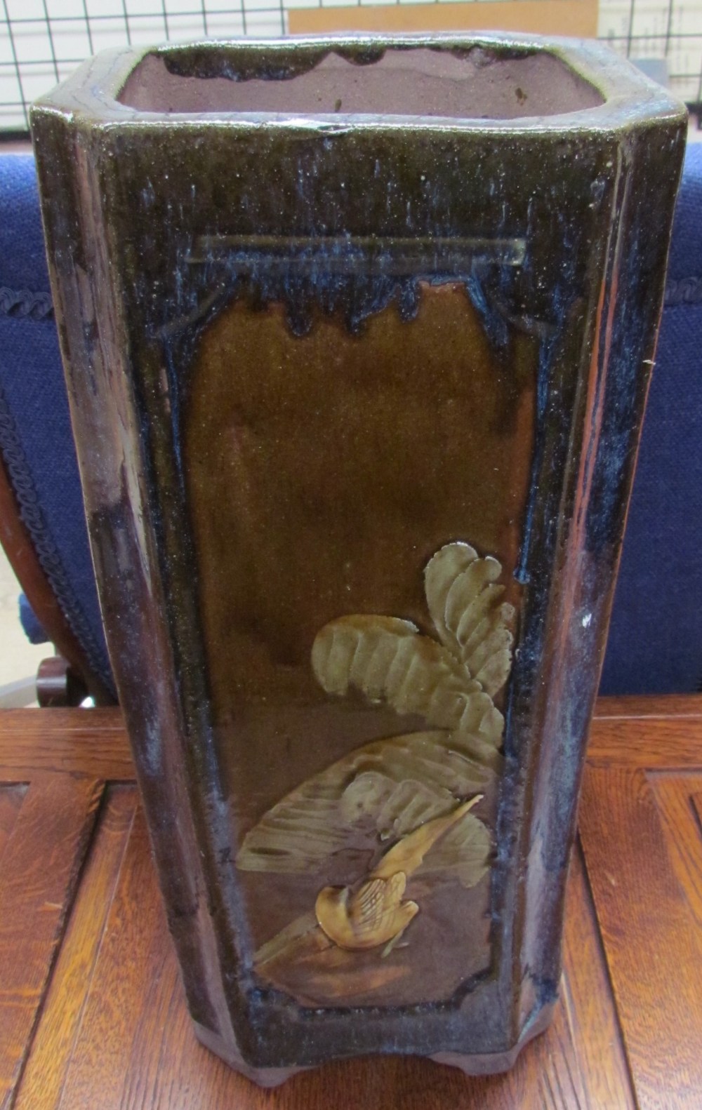 A modern Chinese stoneware umbrella stand decorated with birds and flowers