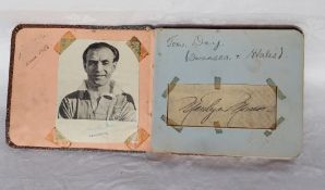 An autograph album, containing various autographs including Stanley Matthews, Tom Day,