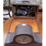 An oak cased Napoleon hat mantle clock,