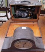 An oak cased Napoleon hat mantle clock,