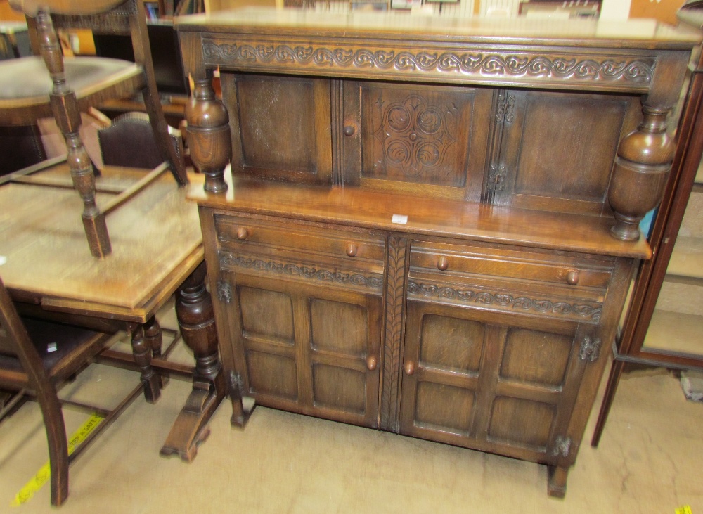 A 20th century oak drawleaf dining table together with a set of five oak chairs and a court - Image 2 of 3