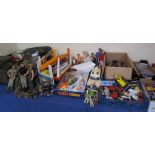 A large collection of Action Man toys, lorry, tank, boat, Thunderbirds, model cars,