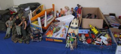 A large collection of Action Man toys, lorry, tank, boat, Thunderbirds, model cars,