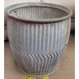 A tin wash barrel,