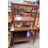 A teak tea trolley,