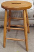 An Elm seated stool,