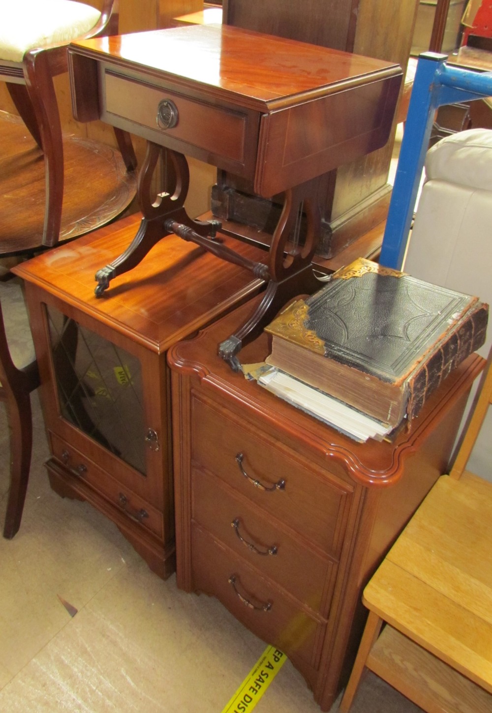 A reproduction mahogany miniature sofa table with drop flaps together with a hifi cabinet,