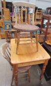 A set of four 19th century spindle back kitchen chairs together with a modern pine dining table