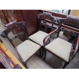 A set of three Regency mahogany dining chairs, with a carved bar back,