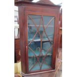 a George III hanging corner cupboard,