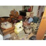 A collection of collectable owls in pottery, glass,
