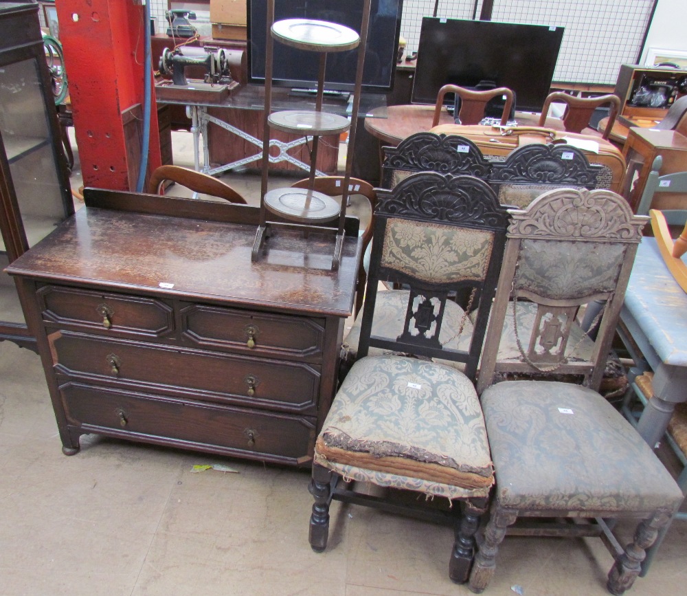 A set of four Edwardian carved and upholstered salon chairs together with an oak chest of drawers