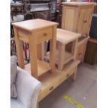 A 20th century limed oak coffee table together with a pair of side cabinets an occasional table and