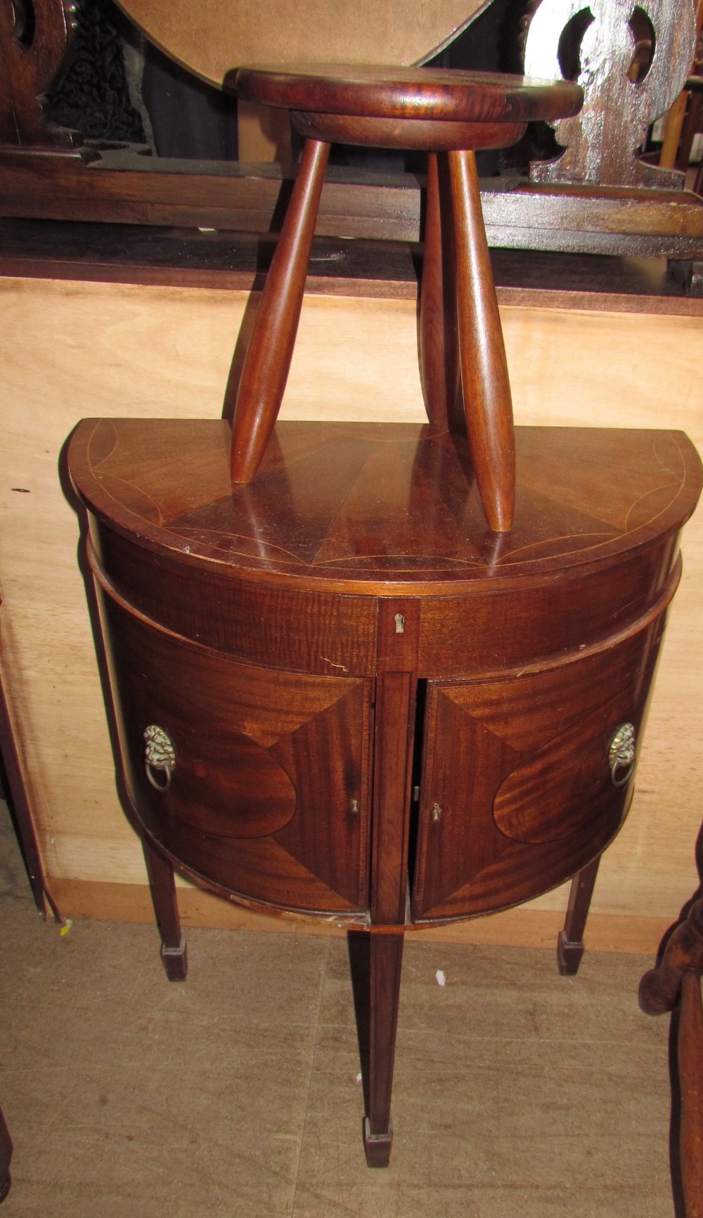 A reproduction mahogany side / sewing table,