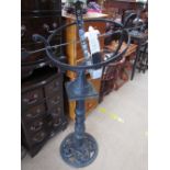 An Armillery Sundial with arrow pointer on a cast iron column