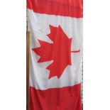 A Canadian flag on a pole