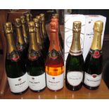 A bottle of Laurent Perrier champagne together with a bottle of Taittinger champagne,