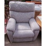 A Timotion TP2 reclining chair in a grey floral fabric